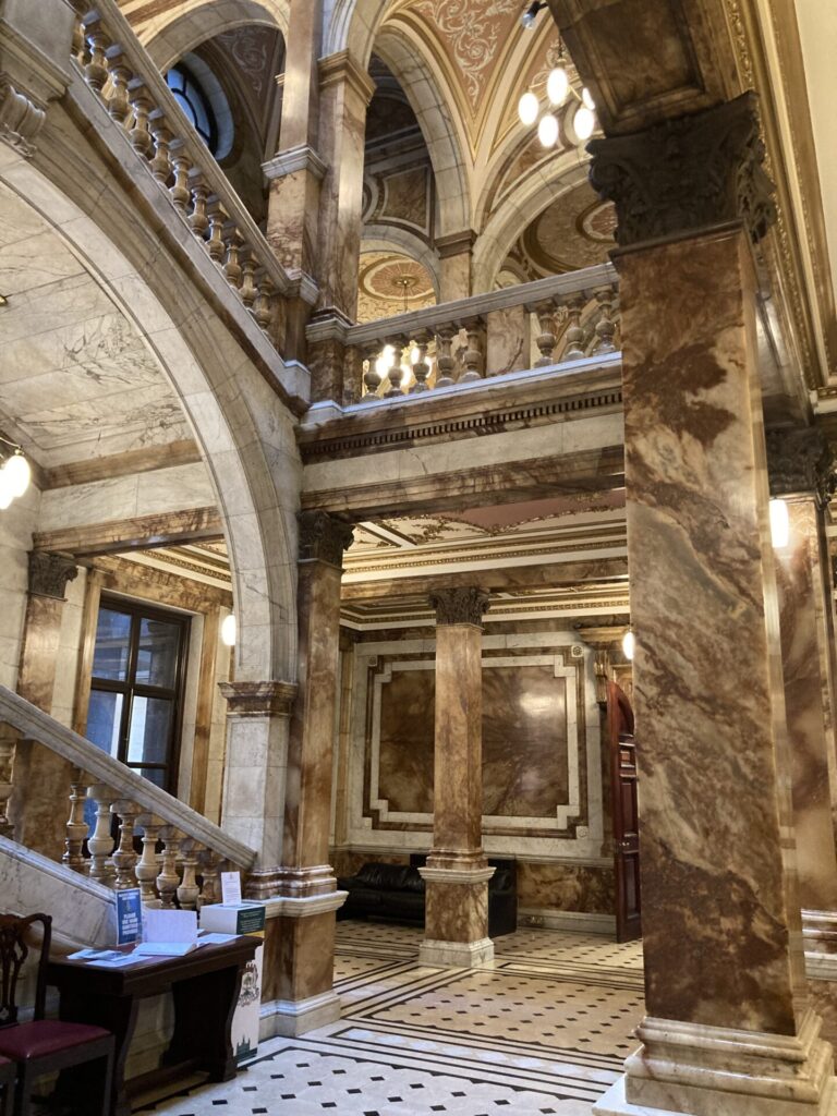 extravagant marbled hallway and staircase