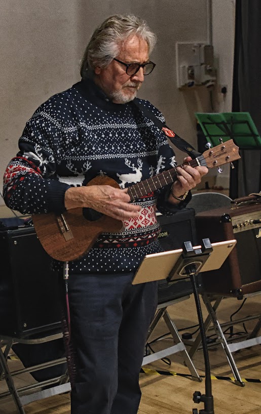 Adrian playing ukulele
