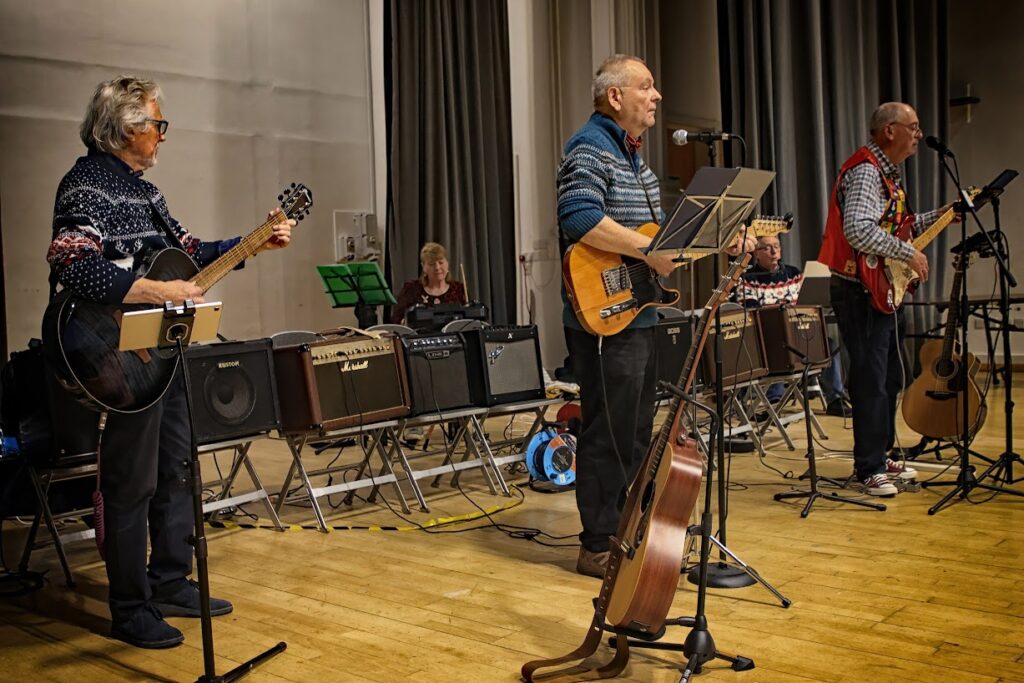 the band playing and singing