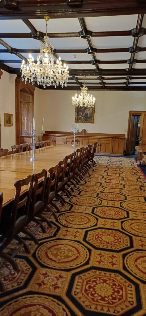 A large dining table and chairs